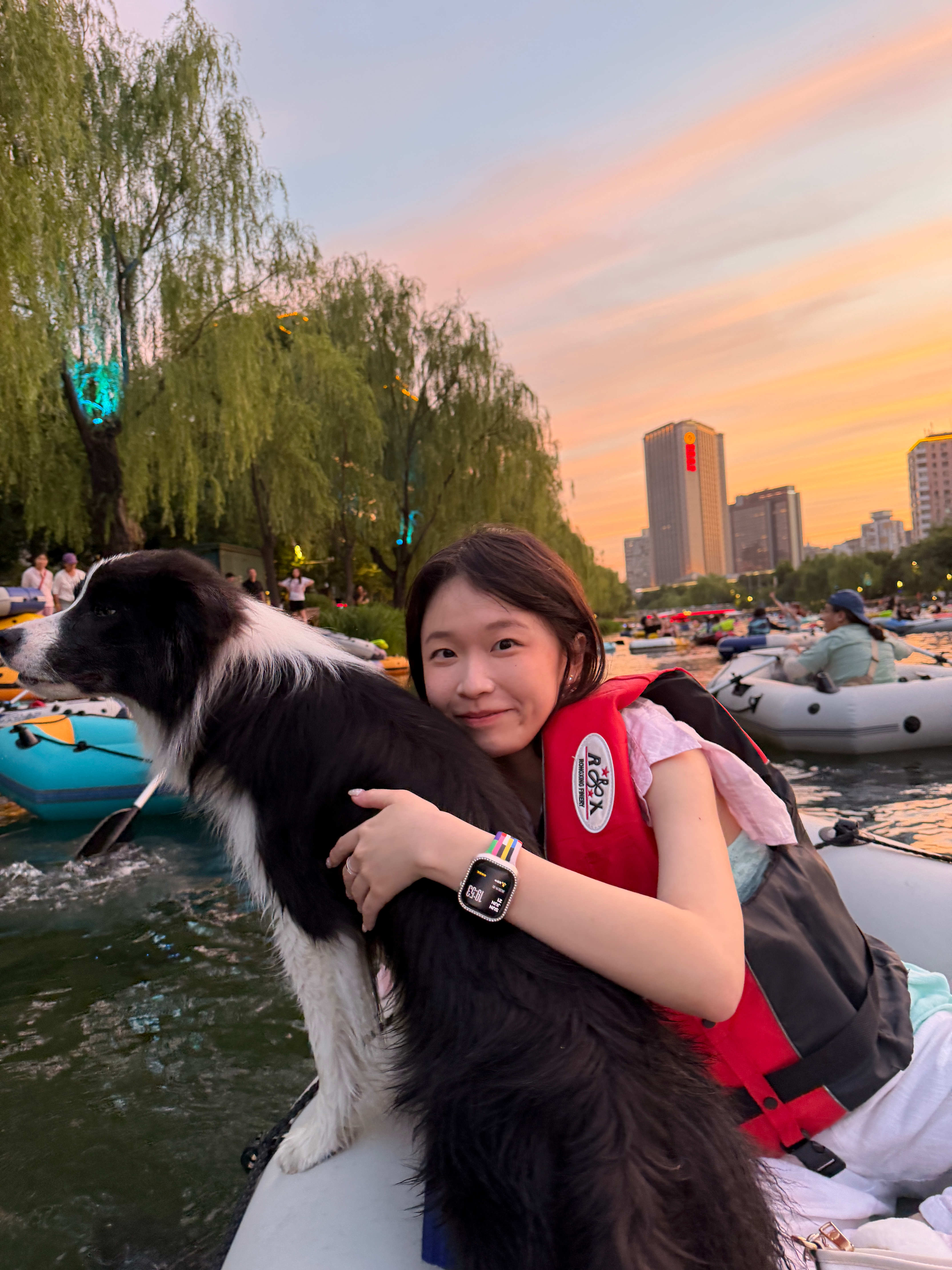 Bella Liu with her dog on the water